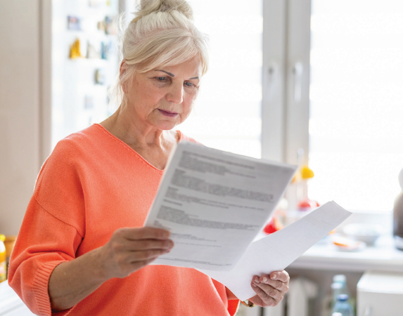 Woman looking at document